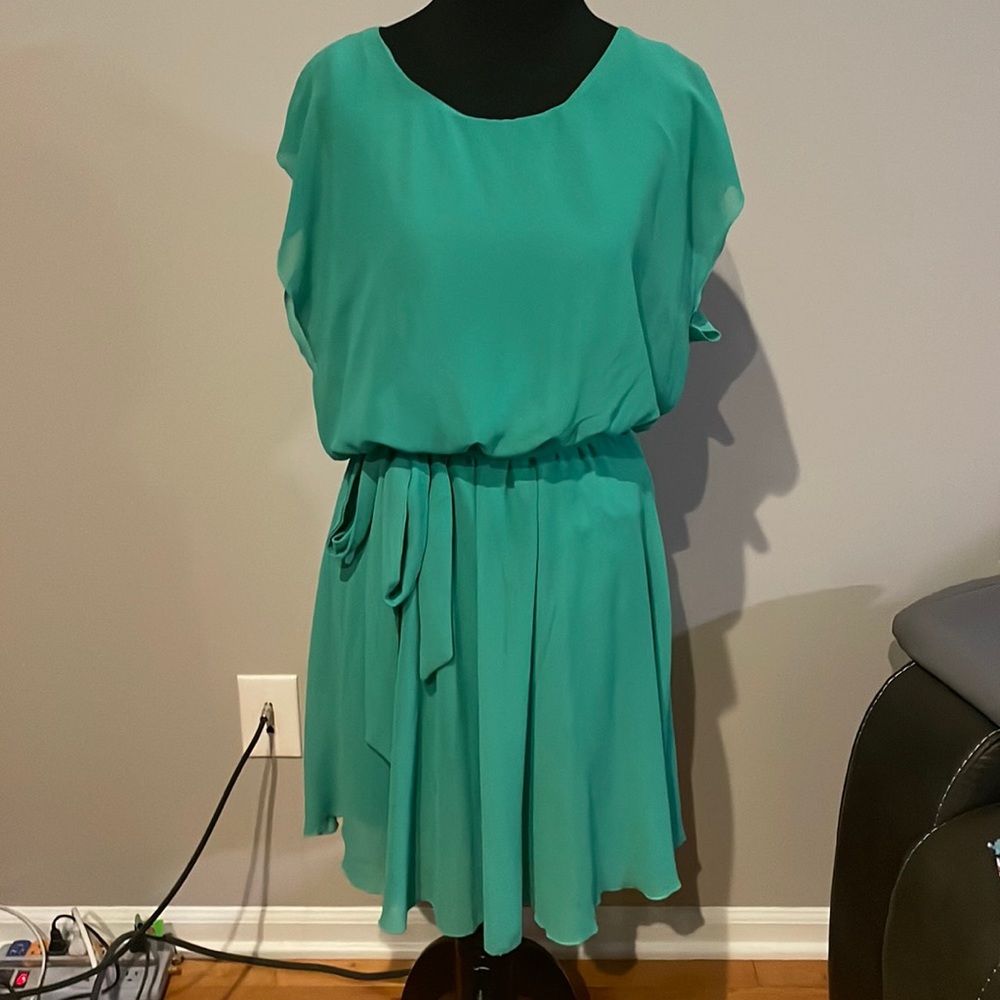 Tacera size large adorable comfy dress!  Very flattering!